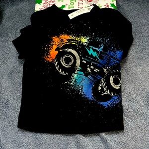 Toddler boys T shirt New 
monster truck 
Size 18m 
New with Tags 
Garanimals